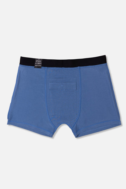 Inside the blue packing boxer briefs with black waistband on a light gray background