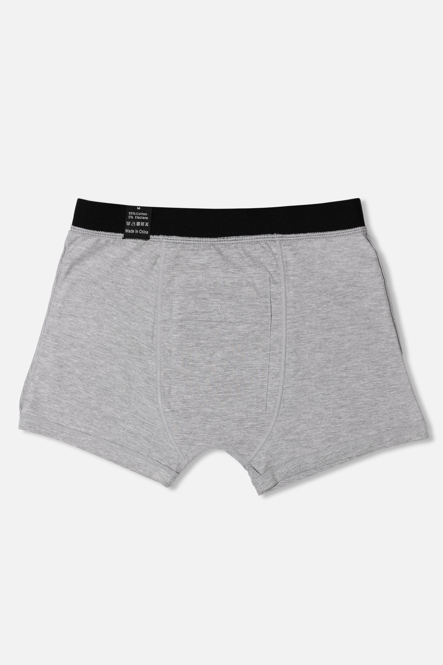 Inside of grey packing boxer briefs with black waistband on a white background