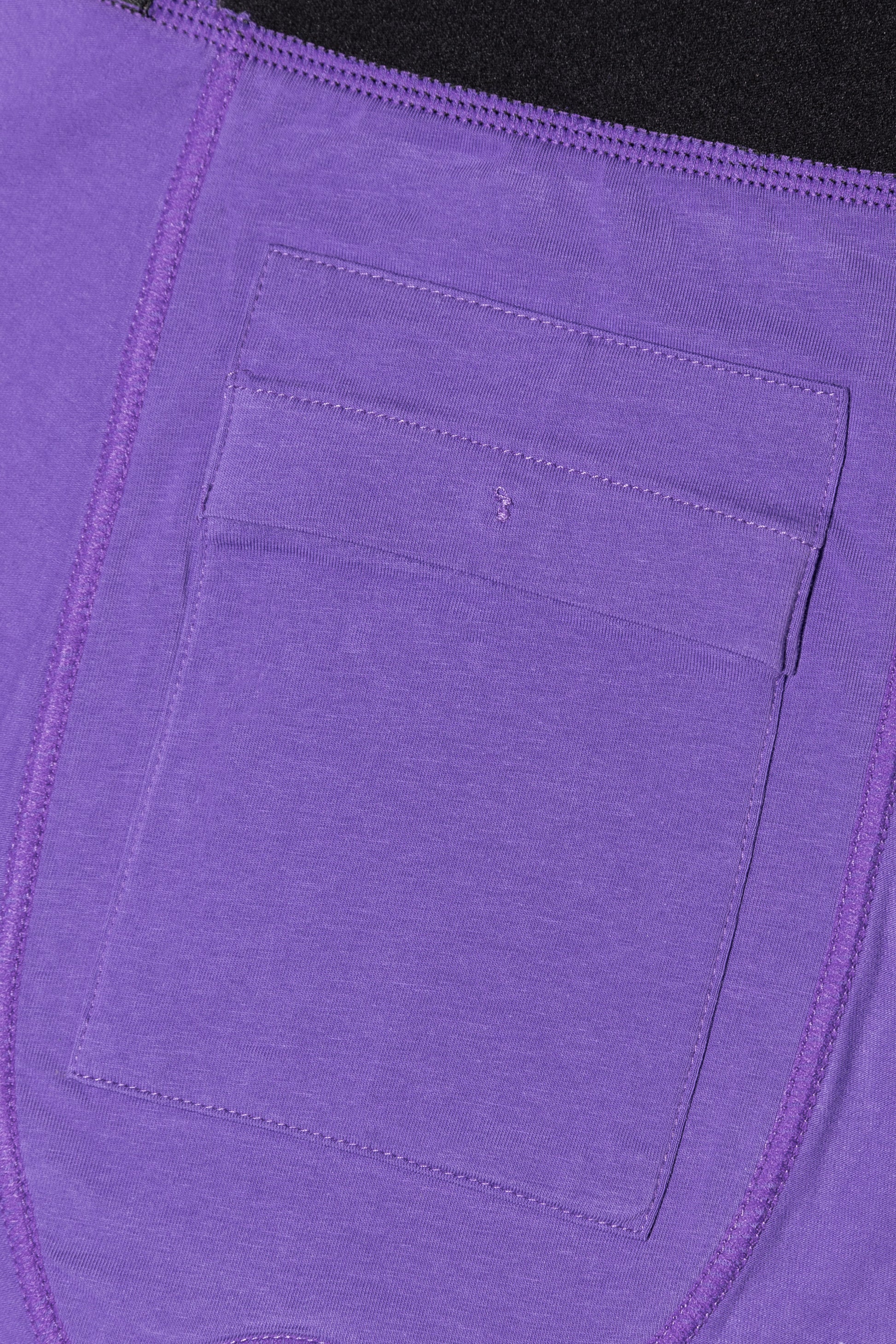 Close-up of a discreet inner pocket inside the purple packing boxers
