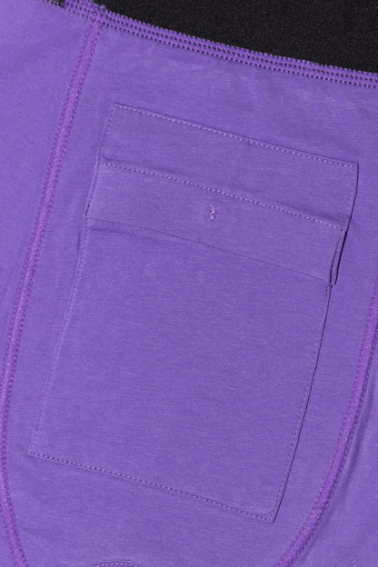 Close-up of a discreet inner pocket inside the purple packing boxers